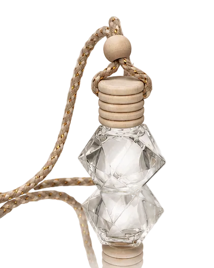 Clear glass bottle with wooden cap and rope on a light background