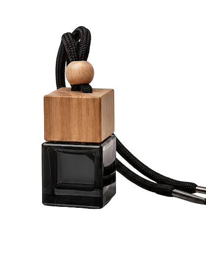 Wooden and black car air freshener on a light gray background