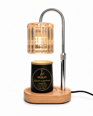 Table lamp with wooden base and glass shade on a white background