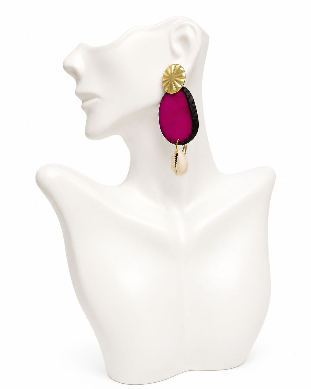 Earring displayed on a white mannequin bust with a plain background
