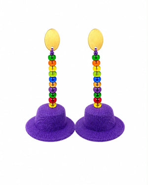 Purple bucket hats with rainbow beaded sticks on a white background