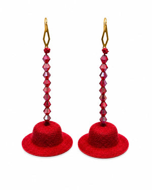 Red felt hat earrings with beaded details on a white background