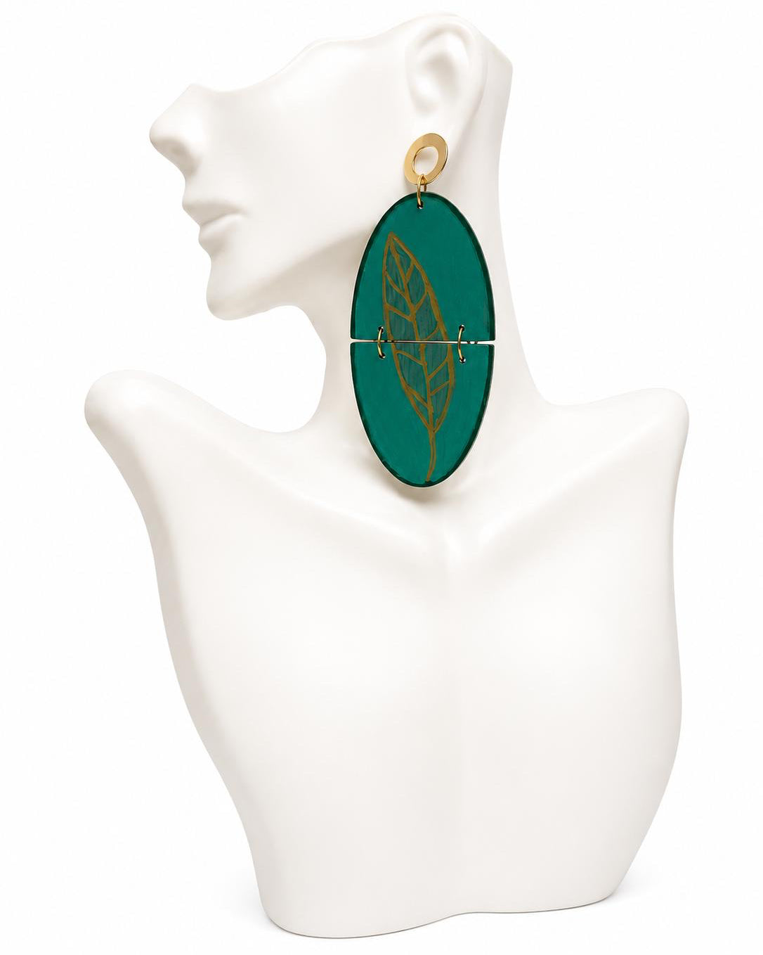 Teal oval earrings on a white mannequin bust